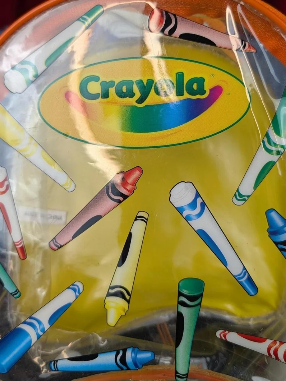 Crayola Clear, Yellow, Red, Blue, Green, Purple, & Orange Rainbow Backpack